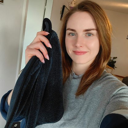 Customer holding the ClearWipe cloth