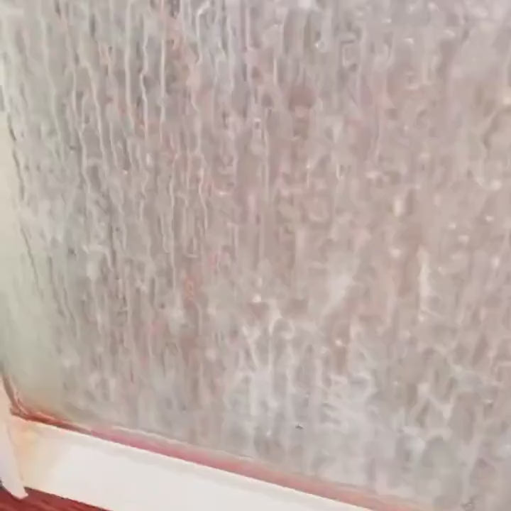 Hard water spots on shower glass